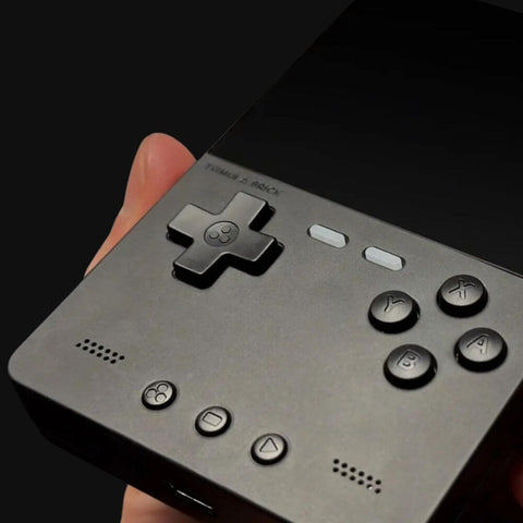 Close-up of gaming console buttons showing D-pad and control layout