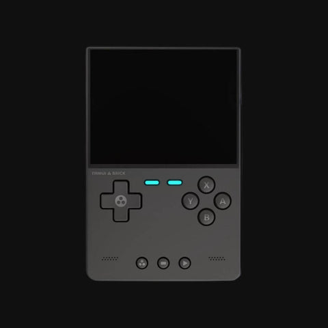 Front view of gaming console in dark gray showing button layout and dual function keys