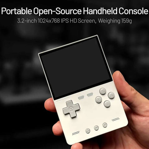 White gaming console being held to show size perspective, with text describing open-source capabilities